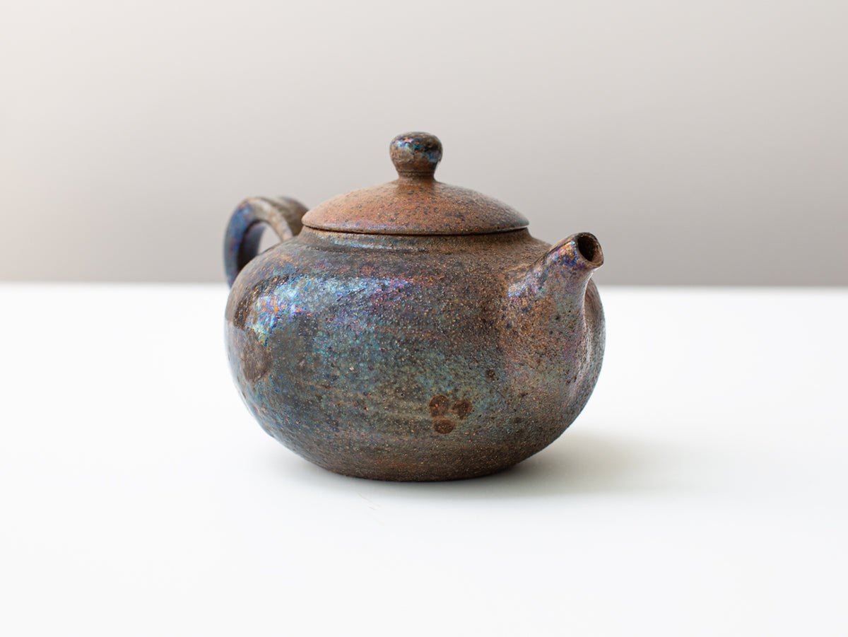 Curvature, wood-fired teapot.