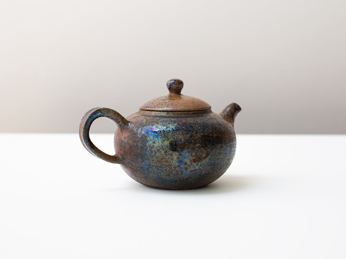 Curvature, wood-fired teapot.