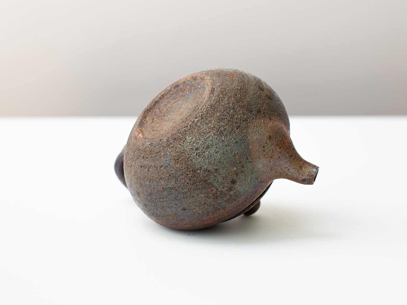 Curvature, wood-fired teapot.