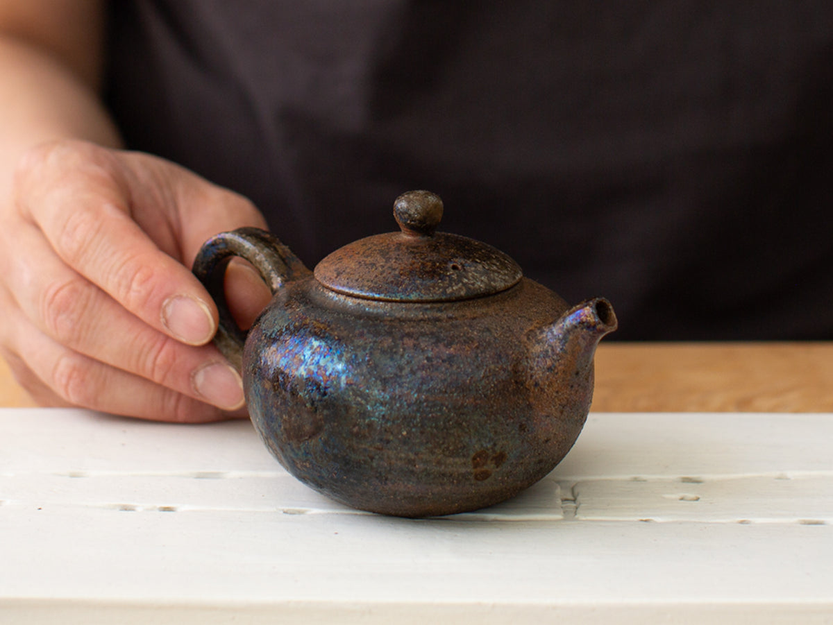 Curvature, wood-fired teapot.
