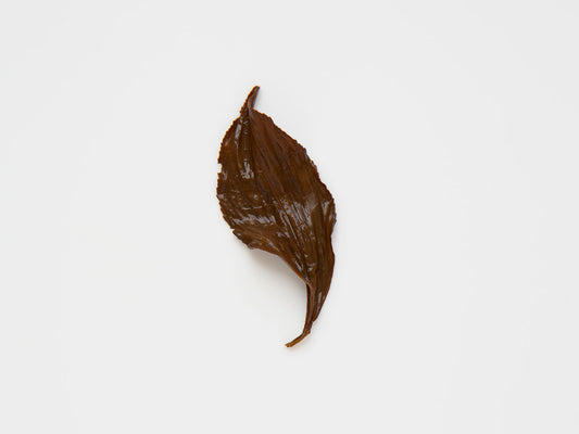 A Different Eighteen. Charcoal roasted red tea.